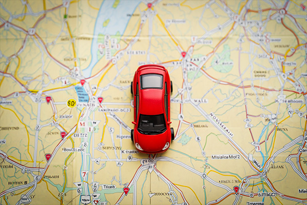 Best car photography locations, image shows a toy car on a map