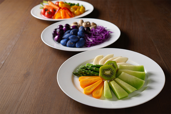 hree plates demonstrating different food plating compositions