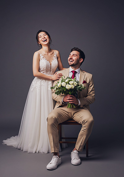 with preset - joyful couple in a studio setting