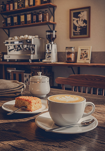with preset - Moody detail shot of coffee and pastries
