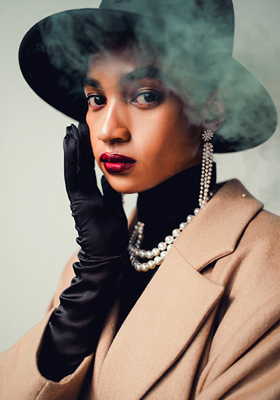 preset example - fashion photo of a glamorous model with a mysterious and alluring facial expression