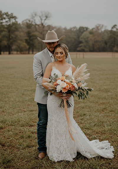before - bride and groom in a rustic outdoor setting