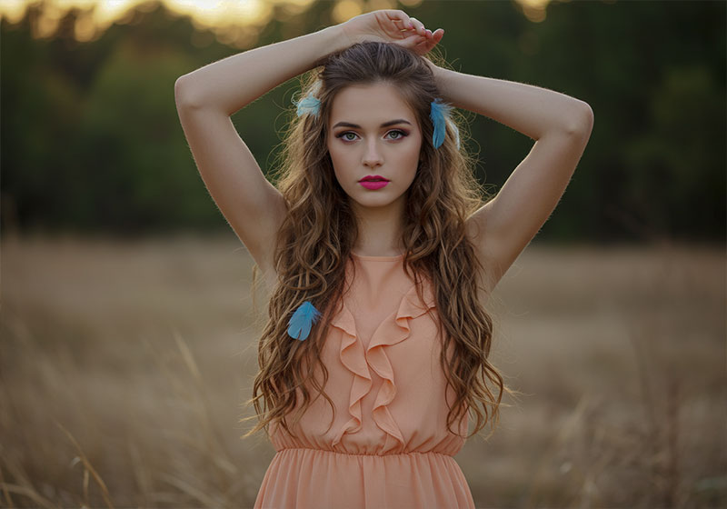 before - young woman with long, wavy brown hair