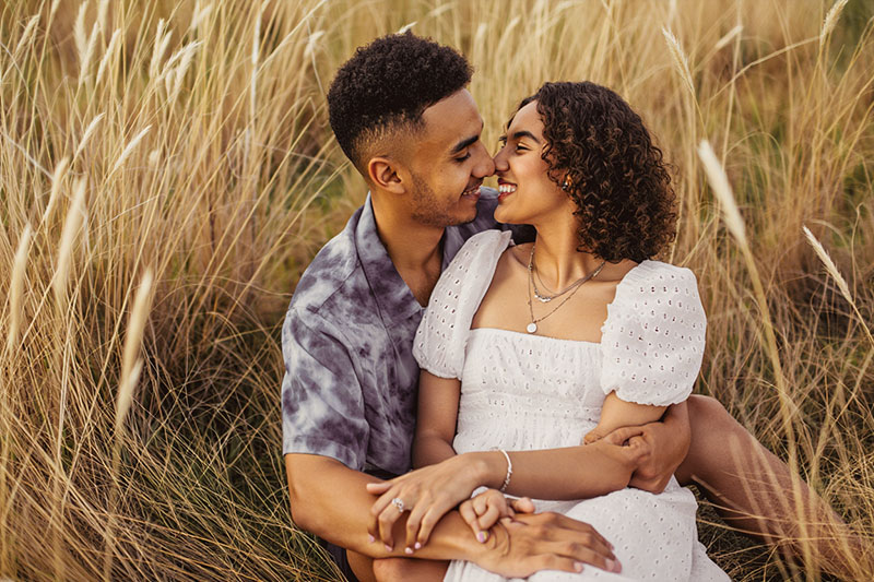 preset example - romantic scene a couple sitting in a field