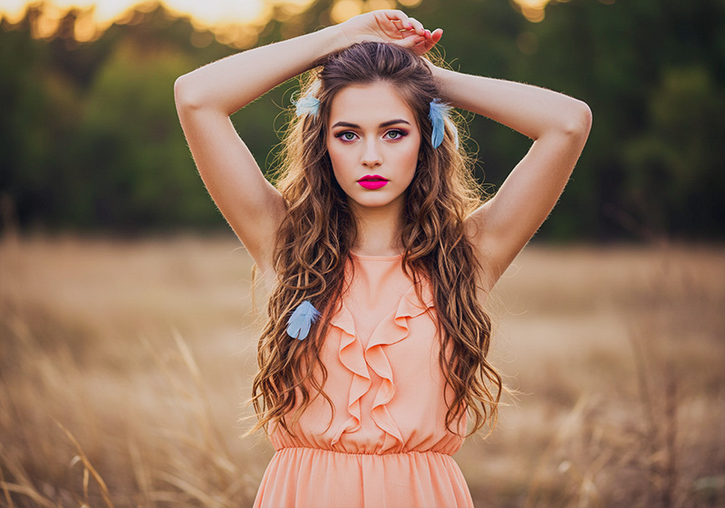 with preset - young woman with long, wavy brown hair