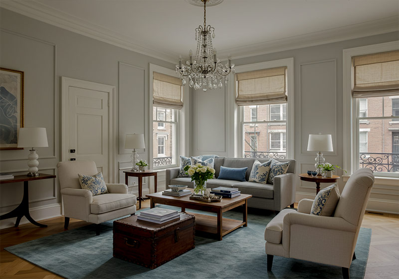before - apartment living room with high ceiling and contemporary furniture
